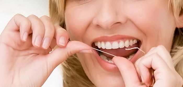 Зубная нить: преимущества для здоровья зубов